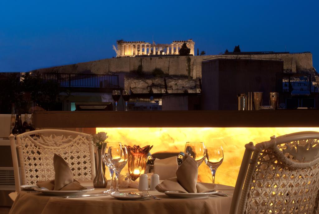 Нова година в The Athenian Callirhoe Exclusive Hotel 4*, Атина: 3 нощувки със закуски, празнична вечеря и самолетен билет!